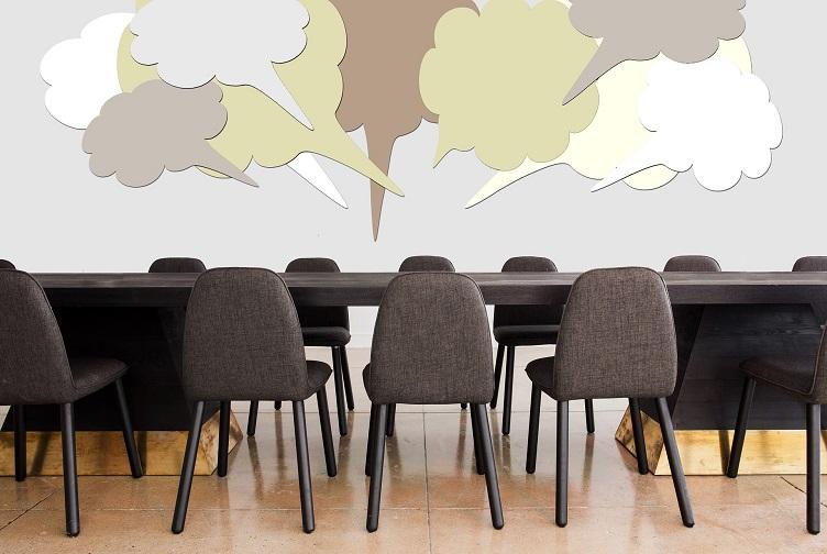 Image of conference room with speech bubbles