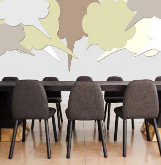 Image of conference room with speech bubbles